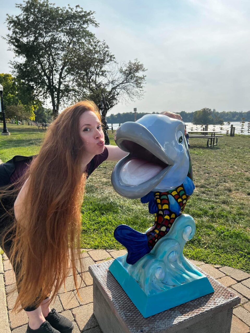Pic of Samantha Germaine Kissing a Fish in Belleville, Mi